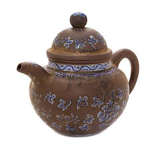 A Blue Enameled Yixing Pottery Teapot Width over handle 7 1/2 inches.