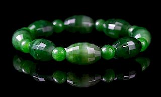 A Spinach Jade Beaded Bracelet Diameter 3 inches.