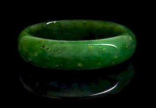 A Spinach Jade Bangle Diameter 3 inches.