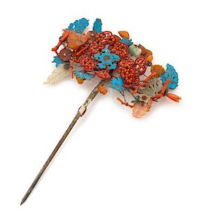 * A Gilt Metal Kingfisher Feather Embellished Hairpin Length 9 inches.
