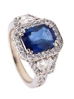 Barmakian Brothers ring in 18 kt gold with 4.47 Ctw in diamonds & sapphires