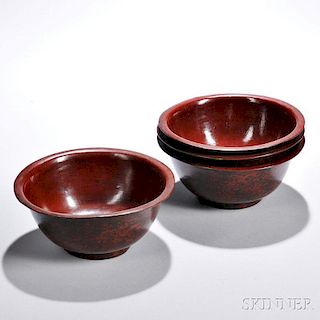 Set of Four Brown-lacquered Bowls