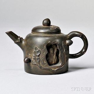 Yixing Teapot with Carved Sage Figure
