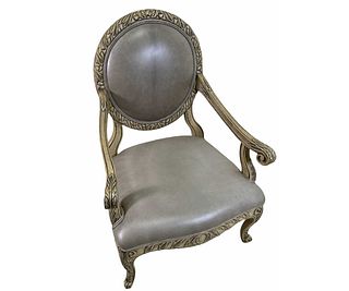 CARVED & PAINTED LEATHER ARMCHAIR