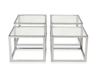 A set of chrome and glass cube coffee tables