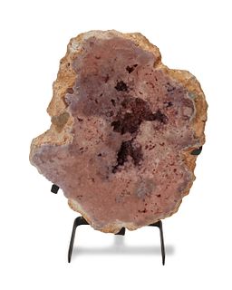 A large pink quartz geode specimen