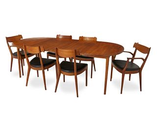 A Drexel "Declaration" modern walnut table and chairs