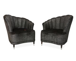 A pair of Art Deco-style lounge chairs