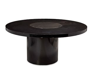 A modern-style black lacquered dining table with Lazy Susan