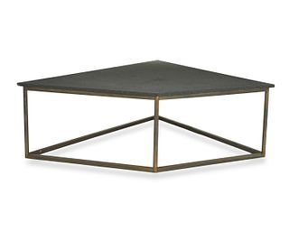 A geometric stone coffee table, by Martyn Lawrence Bullard