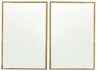 A pair of Restoration Hardware brass wall mirrors