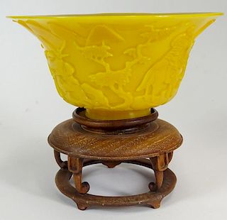 Chinese 19th Century Imperial Yellow Peking Glass Bowl with Carved Mountain Landscape Decoration.