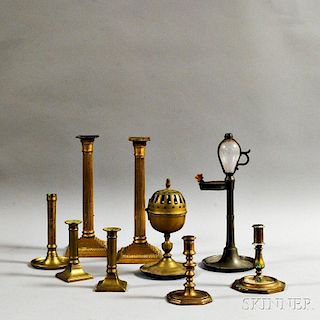 Nine Brass and Pewter Lighting Devices