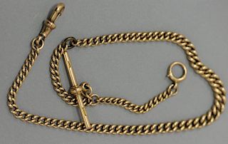 15K gold watch chain with T bar. 
29.3 grams