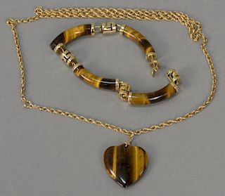 Two piece lot including tiger eye and 14K bracelet and chain with pendant. chain lg. 25 in.; earrings 3 1/2 in.