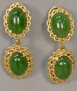 Pair of green jade earrings set in 18K gold.