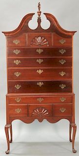 Margolis mahogany Queen Anne style highboy in two parts, upper portion with broken arch top over three drawers over four drawers on ...