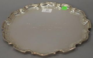 Tiffany & Co. shaped tray marked Tiffany & Co. Makers, monogrammed. 
dia. 12 in.; 28.7 t oz.
