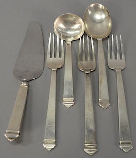 Tiffany & Co. Hampton pattern six piece serving set to include three forks, one large spoon, one ladle, and one cake knife. 
spoon: ...
