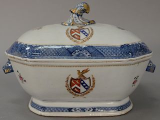 Armorial export porcelain covered tureen with boar head handles, repetative blue borders with butterflies in underglaze blue and shi...