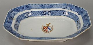 Armorial export deep platter having repetative blue borders with butterflies in underglaze blue and shield coat of arms (roughness t...