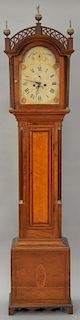 Federal cherry tall clock with fretwork top over tombstone door flanked by fluted columns with birdseye maple door flanked by fluted...