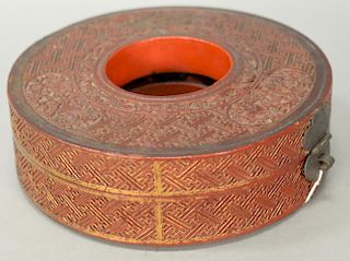 Chinese red cinnabar round box with gilt remnance around edges. 
ht. 2 1/2 in.; dia. 8 in.