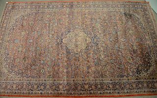 Kashan Oriental carpet (one cut - approximately 10 inches). 
12'3" x 19' 

Provenance: Property from Credit Suisse's Americana Colle...