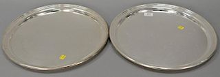 Two Cartier sterling silver round trays, no monogram. 
dia. 16 in.; 81 t oz.