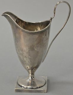 English silver creamer, urn form with handle on square base, marked RH. 
ht. 6 in.; 3.8 t oz.