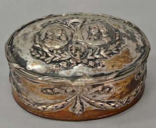Continental covered silver box, oval form with two embossed figures, marked 800. 
lg. 4 in.; 5.7 t oz.