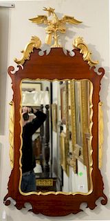 Margolis mahogany Chippendale style mirror with gilt bird and gilt trim, signed Margolis on back. 
ht. 50 in.; wd. 25 in.