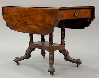 Federal mahogany drop leaf table with two drawers on spiral turned supports set on plain base on four carved downswept legs ending i...