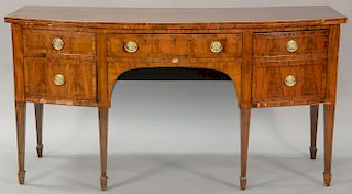 George III mahogany sideboard having banded inlaid bowed front top over center drawer flanked right by double drawer left by drawer ...