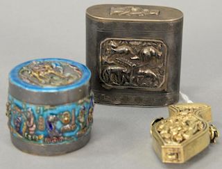 Group of three Oriental silver boxes including one with an enameled top and sides, one pierced in the form of a snuff bottle, and on...