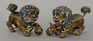 Pair of Chinese silver vermeil and enameled foo lions marked silver on feet. 
ht. 2 1/ in.; lg. 4 in.
