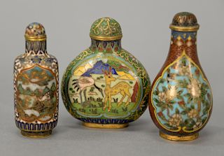 Three cloisonne snuff bottles, one marked on bottom. 
ht. 2 1/2 in. to 2 3/4 in.