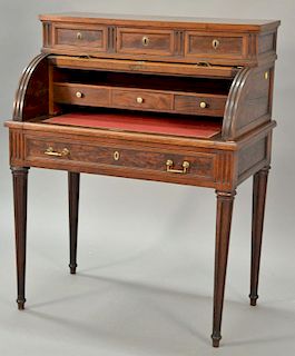 Mahogany ladies cylinder roll top desk having three drawers over roll top with pull out felt writing surface over drawer set on turn...