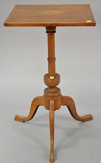 Federal cherry candlestand with square top having oval panel inlay set on turned shaft on tripod base. 
ht. 26 1/2 in.; top: 15 3/4"...