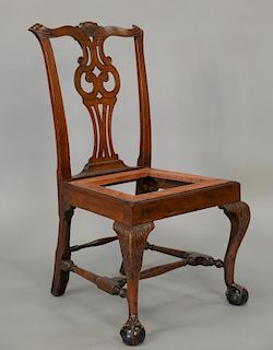 Chippendale mahogany side chair having carved crest rail over pierced carved splat over slip seat set on cabriole legs ending in cla...