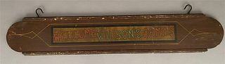 "Welcome to Wilson's Camp," Wooden Sign