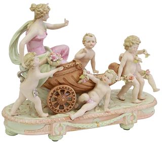 BISCUIT PORCELAIN FIGURAL GROUP, CHARIOT & PUTTI