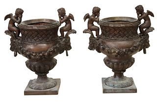 (2) NEOCLASSICAL STYLE PATINATED BRONZE PUTTI URNS