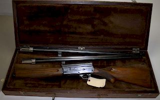 Cased Browning Arms Model A-5 12 ga (2¾) semi automatic shotgun. Extra barrel, SN 273246. Engraved w