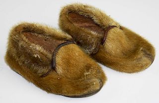 Pair seal skin and leather eskimo child's moccasins. 6"l.
