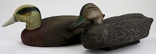 Two signed Decoys Unlimited foam body black and made for Abercrombie & Fitch Co.