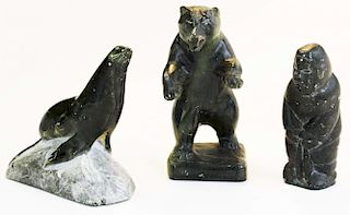3 Inuit soapstone carved figures- bear signed Luke, unsigned hunter, seal, hts 4.5” -5.5”