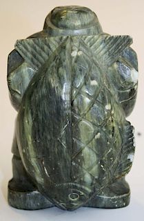Inuit soapstone carving of a hunter w/ a large fish signed Kaxuitak, slight damage, wear to high spo