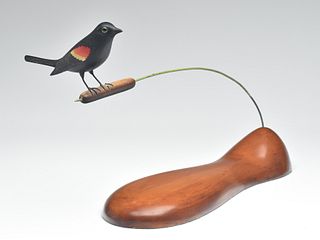 Important and unique full size red-winged blackbird mounted on a carved cattail, Elmer Crowell, East Harwich, Massachusetts, 1st quarter 20th century.