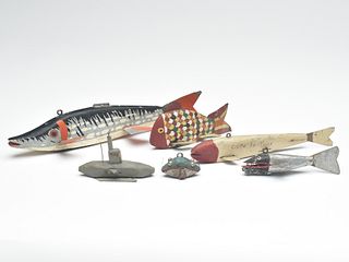 A wonderful collection of six working fish decoys found in Minnesota.